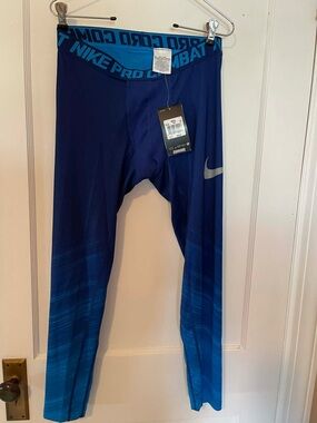 Nike Men's Blue Compression Shorts with Swoosh